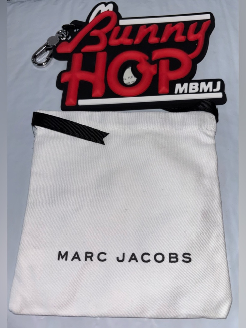 Marc Jacobs Key Ring Comes With White Drawstring Dust Bag